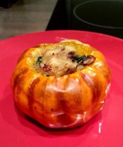 Baked mini-pumpkin with sausage, spinach, & mushroom stuffing